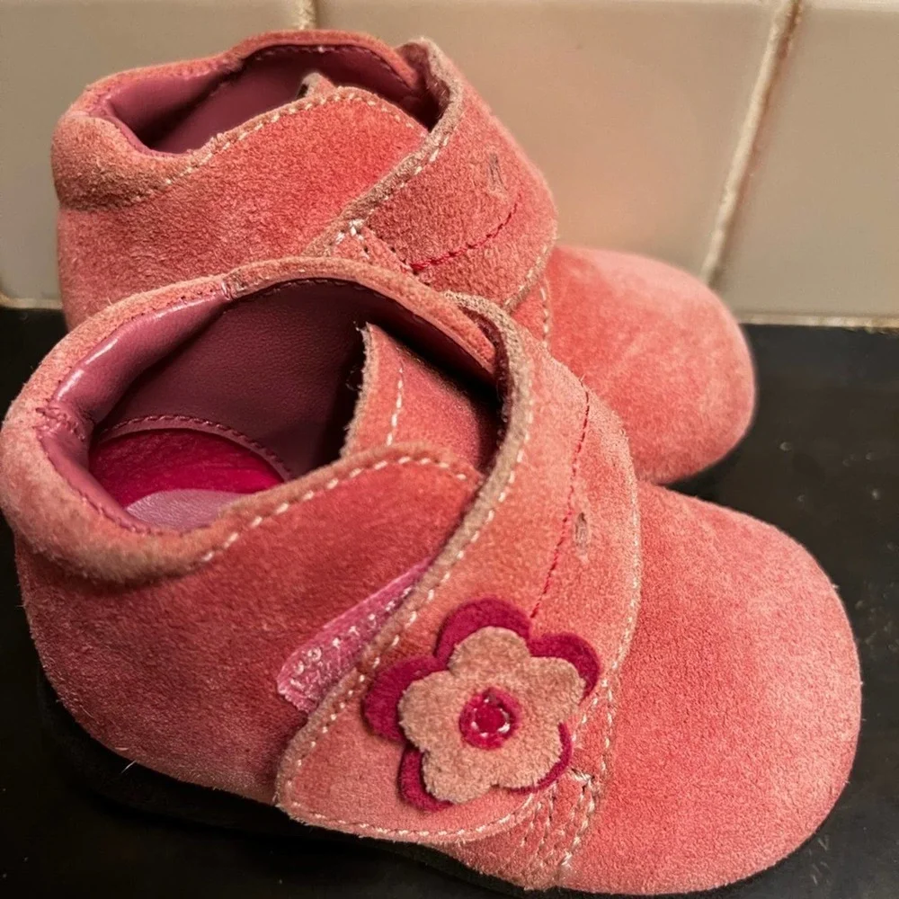 Adorable pink suede baby shoes